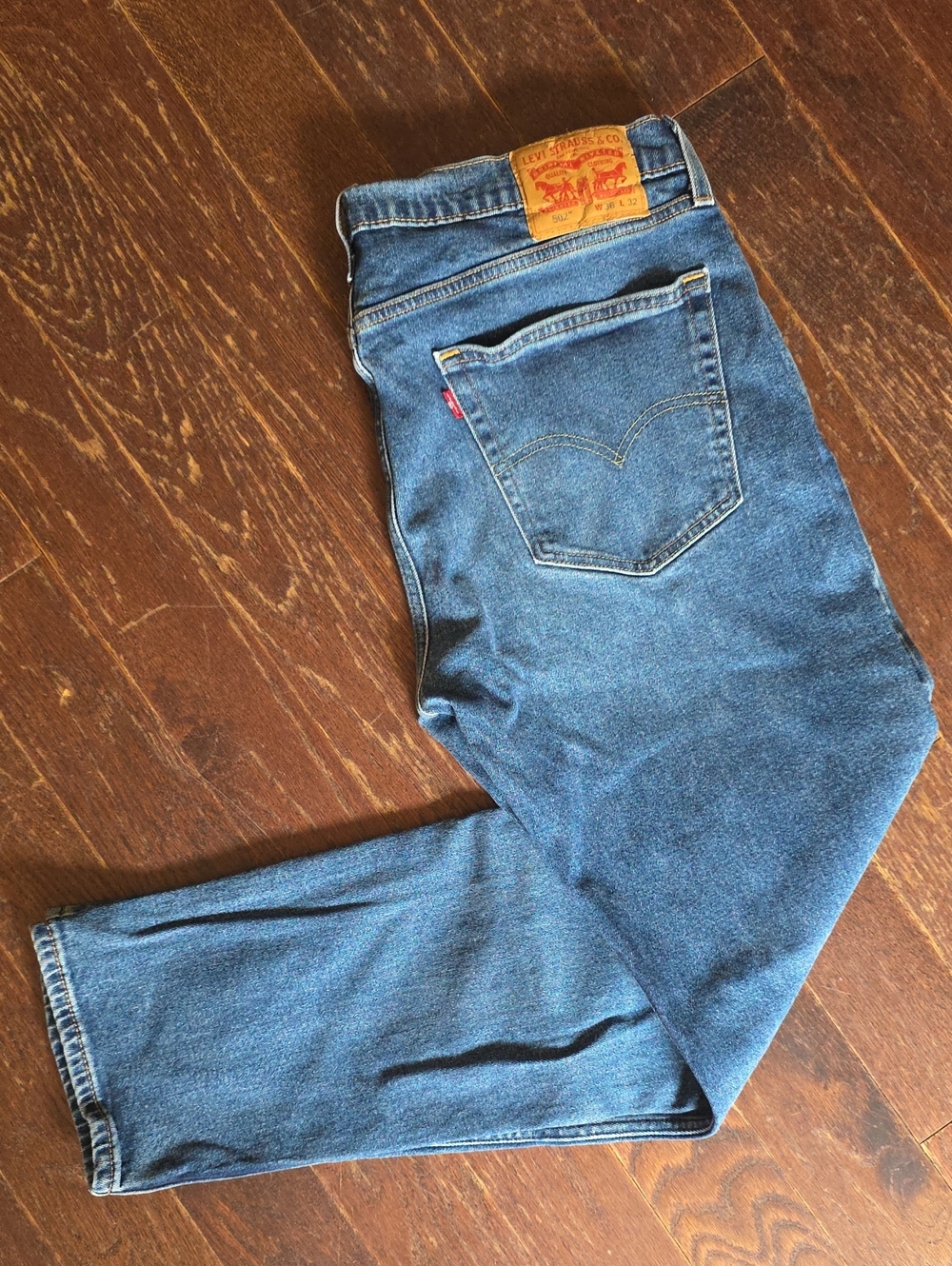 Levi's Blue Denim Jeans with Tan Leather Patch and Red Tab